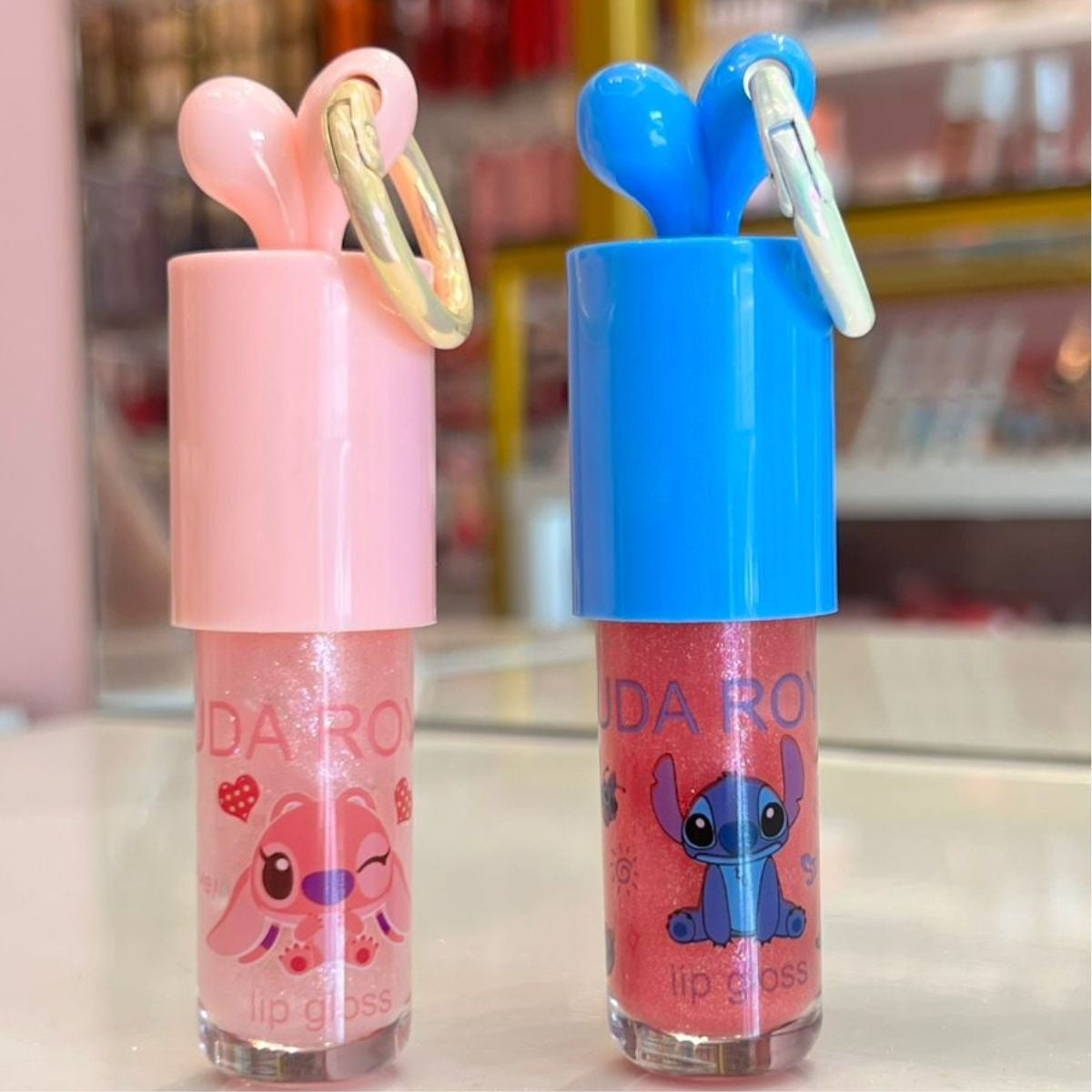 Duo Lip Gloss Stitch e Angel  - Huda Royal
